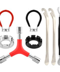 No Sweat Road Warrior Bike Repair Kit Featuring Five Universal Spoke Wrenches Two Heavy Duty Tire Levers And One Y Shaped Socket Adapter showing tools.