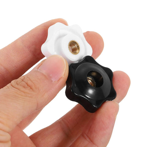 Close-up of Star Knob Set M6 Thread 32mm Plastic Head Through Hole Hand Knobs For Jigs And Clamps 20 Pieces Black And White 6 Point Design