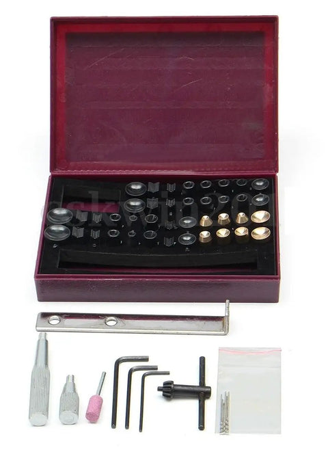 Real Deal Precision Pearl Drilling Machine With Two Hundred Watt Pedal Motor And Adjustable Depth Guide For Shell Coral Amber Stone Silver Jewelry Making Workshop accessory kit with assorted collets and tools.