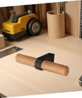 Solid Wood Cabinet Handle Black Drawer Pulls With Single Hole on a wooden surface next to a ruler and tools