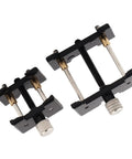 Two Piece Watch Movement Holder Kit With Non Slip Fixed Base And Plastic Repair Tool, black holders with metallic screws viewed from top
