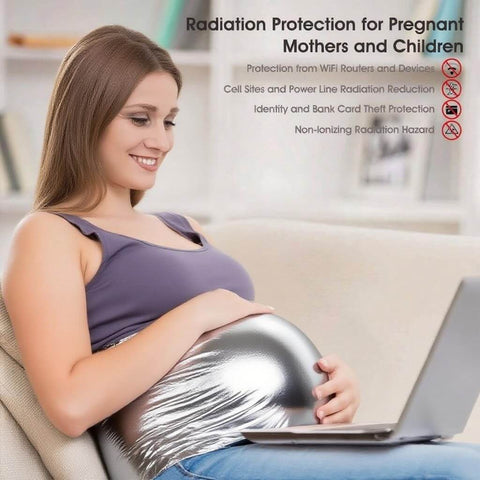 Pregnant woman using laptop with Soft Conductive Shielding Fabric for radiation protection focused on EMI RF shielding.