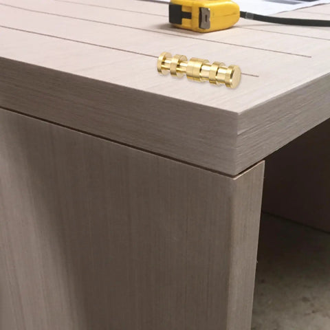 Premium Brass Table Leaf Dowel Pins And Extension Table Connectors on a wooden table edge for secure alignment and stability.