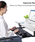 Hella Sturdy Under Desk Keyboard And Mouse Tray Pull Out Sliding Platform With Secure C Clamp Mount System Instant Install Height Adjustable For Ergonomic Workstation in use, showcasing adjustable slide-out design.