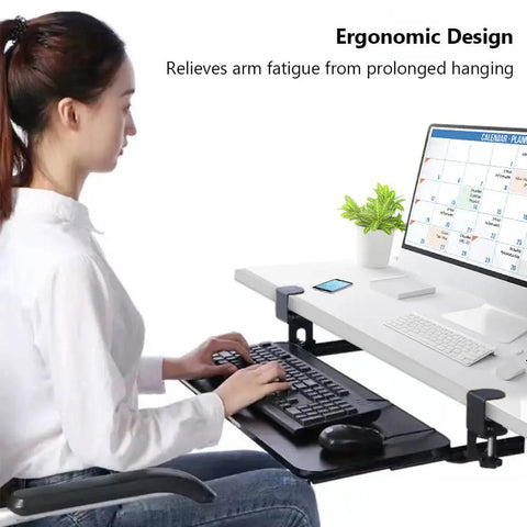 Hella Sturdy Under Desk Keyboard And Mouse Tray Pull Out Sliding Platform With Secure C Clamp Mount System Instant Install Height Adjustable For Ergonomic Workstation in use, showcasing adjustable slide-out design.