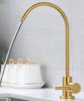 NYTFHMS Drinking Water Filter Taps Kitchen Sink, Purifier Faucet, Stainless Steel Gold 1/4 with flowing water in kitchen.