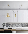 Creative Lifting Ceiling Hanging Light Modern Cooper Adjust Line Pendant Lamp for Bar Home Restaurant,Exquisite in a stylish kitchen.
