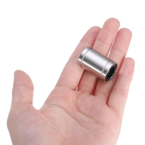 2Pcs LM10UU Linear Bearings Featuring 10mm Bore And 19mm Outer Diameter double rubber seals held in hand.