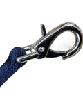Close-up of a solid nickel buckle on a heavy-duty nylon lunge strap, part of a Double Buckle Swivel Lunging Chin Strap for Horse Training.