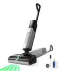 Zero Drama Cordless Wet And Dry Vacuum Cleaner Killing Sticky Messes With 20000Pa Suction, Tangle Free Rollers, Hot Water Wash, Instant Self Dry, Lie Flat Maneuver, And Plug Ready Charging Dock on a flat surface with cleaning accessories.