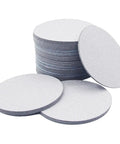 Grab This Awesome 100 Piece Set Of 5 Inch Wet Dry Sanding Discs With Grit From 60 To 1000 stacked and loose discs on a white background.