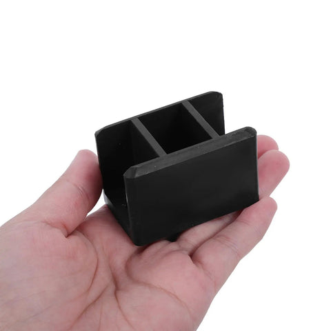 Hand holding Heavy-Duty Black Right Angle Furniture Brackets Set 10 Pack for Steel Frame Shelves, showcasing bracket size and durability.