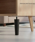 5.9 Inch Conical Furniture Leg With M8 Thread Replacement For Sofa Cabinet Chair Wobble Fix PP Plastic And Metal 2.2 Inch Top Diameter Durable Support For Mid Century Style Furniture, attached to a cabinet.