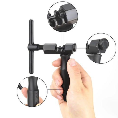 Hand holding Universal Bike Chain Breaker Tool for 1 to 13 Speed Chains with Spare Replaceable Pin Durable Chain Cutter.