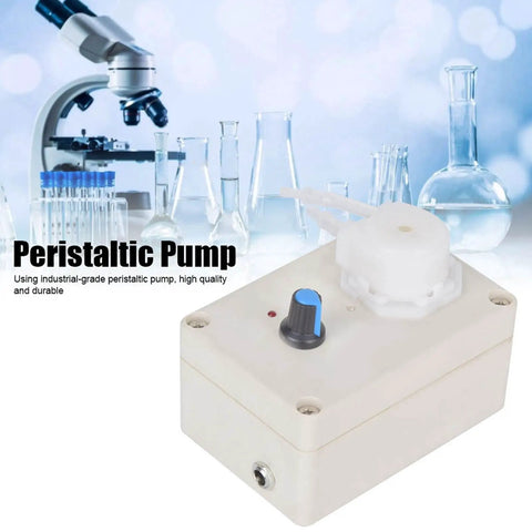 Peristaltic Liquid Dosing Pump For Lab And Aquarium Use 110 To 240 Volts, 50 And 60 Hz, 4 Watts, with laboratory glassware in background