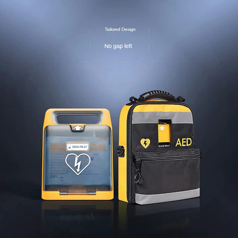 AED storage bags: yellow STMKB defibrillator pouch with clear front; yellow-black AED case with reflective strips.