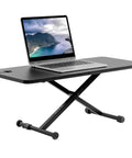 Black 28 Inch Standing Desk Converter Sit To Stand Monitor Riser With Scissor Lift Height Adjustment, laptop displayed on top