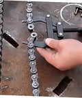 Heavy Duty Motorcycle Chain Tensioner Chain Adjuster Tool For Quick Bike Tune Ups Universal Fit being used on a motorcycle chain.