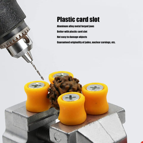 Heavy Duty Mini Suction Cup Vise Bench Mount 360 Rotation Universal Desktop Clamp For Woodwork with yellow grips holding an item.