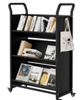 V Shaped Metal Rolling Book Cart With Three Tier Shelves, Side Hooks, Lockable Wheels displaying books and a bag, black.