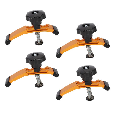Get Locked In With These Heavy Duty Press Plate Clamps, Aluminum T Track Hold Downs For Engraving And CNC Router Plus Rubber Pads To Skip The Slip On Drill Press Or Workbench And Nail Precision Every Single Time - Set of four aluminum clamps with black knobs and springs.