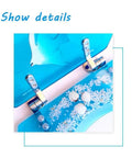 Close-up view of slick heavy duty resin toilet seat cover with soft close hinge, showcasing blue design and decorative elements.