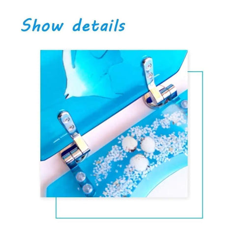 Close-up view of slick heavy duty resin toilet seat cover with soft close hinge, showcasing blue design and decorative elements.