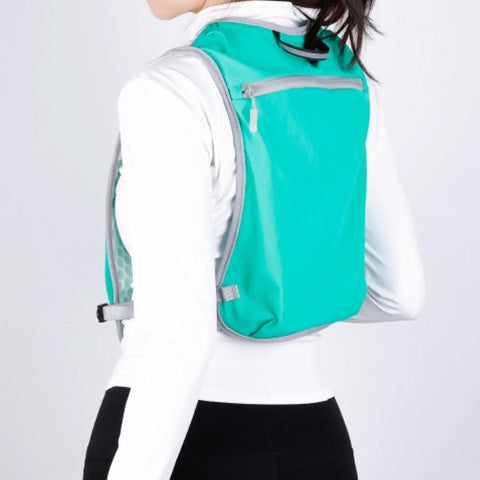 Back view of Run Ready Hydration Vest Lightweight Running Backpack with adjustable water bag in blue, worn by person.