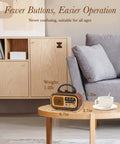 J-150 Portable Radio AM FM SW Bluetooth Speaker with retro vintage design on a coffee table in a living room setting