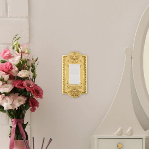 Meadows Light Switch Cover Plate In Greek Revival Style With Decorative Border And Curved Edges in polished brass on wall