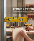Spirit Level, Aluminum Alloy, 250mm held against wood for precise leveling in a workshop setting.