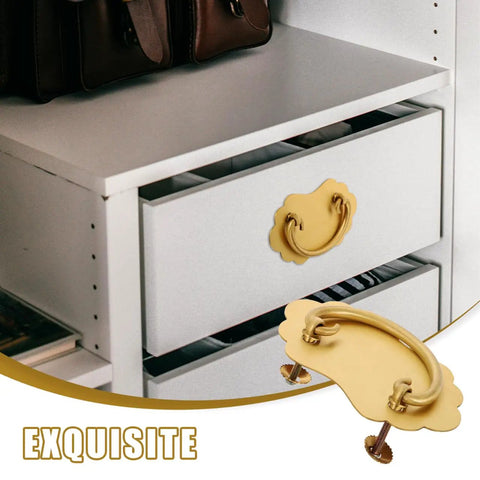 Vintage Brass Drawer Handles Two Hole for Chinese Style Furniture on white drawer, showcasing retro hardware with patina