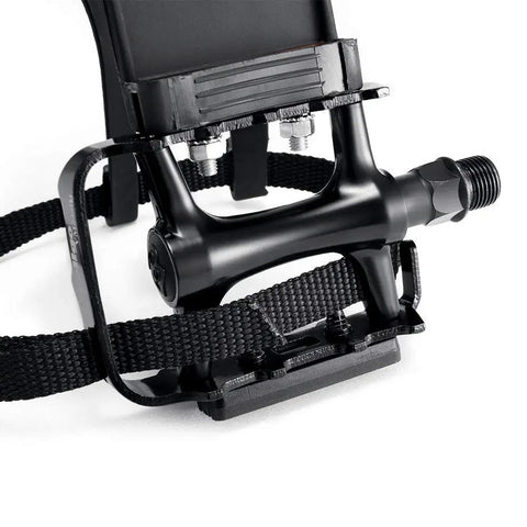 Close-up of Toe Clip Bike Pedals With Straps For 9 Sixteenth Inch Axles Universal Fit No Slip Grip, alloy and resin construction.