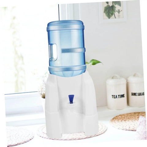 Tabletop Water Dispenser Cooler For Home Office And Outdoor Use on kitchen counter with blue water bottle and white base