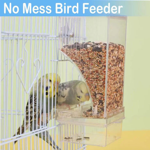 Total Game Changer For Pet Parents Seeking Spill Proof Auto Bird Feeder Cage Dish Made From Heavy Duty Clear Acrylic That Lets Cockatiels Parakeets Canaries And Conures Eat Fresh Seeds Anytime in a birdcage with two parakeets.