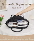 Open black bag revealing Three Pack Medium Clear Hard Shell Zipper Pouches for purse and diaper bag organizer and travel essentials
