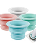 Silicone Drain Seal Plug 4 Pack For Toilets, Bathrooms, Kitchens And Washing Machines Odor Control Flexible Sewer Seal Ring in blue, pink, white, and green.