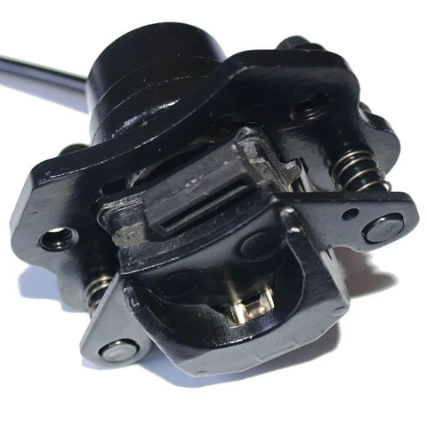 Close-up of rear hand hydraulic disc brake master cylinder caliper assembly with new brake pads for 50cc to 250cc ATVs
