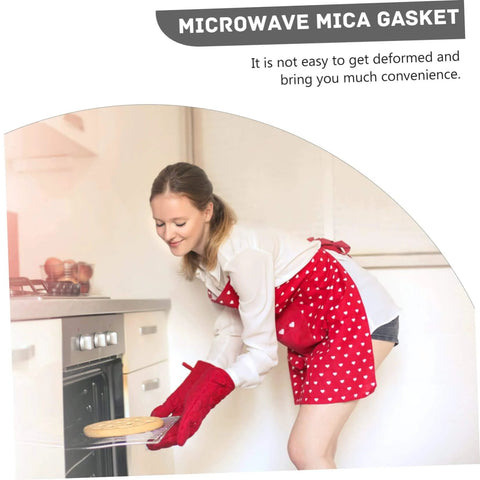 Woman using ten piece microwave mica sheets for oven insulation and heat resistant shield reusable mica plates.