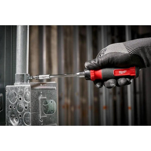 27-In-1 Screwdriver Set With M-BIT RCHT, Red Handle, 48-22-2904, used for tightening a screw in a metal fixture