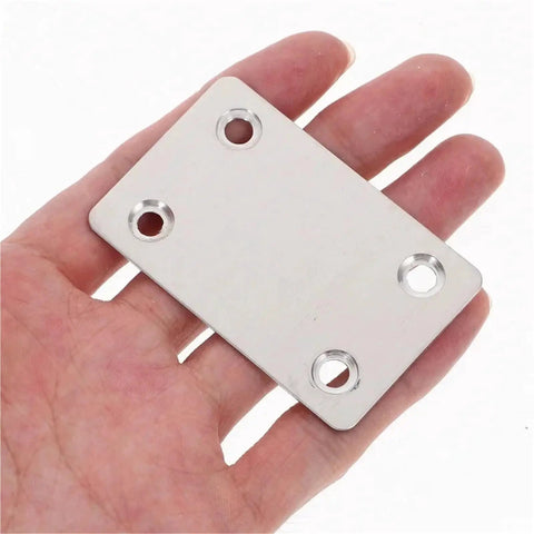 Dang Solid Stainless Steel Mending Plates Set Packs Forty Corner Angle Braces For Furniture Cabinet Wood Repair Featuring Pre Drilled Holes shown in hand.