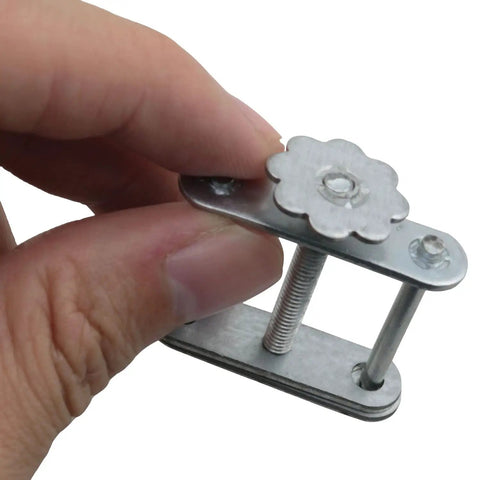 Close-up of a Four Pack Flow Control Hose Clamps Iron Plated Water Stop Clip with Swivel Screw for liquid flow control