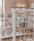 Square Profile Metal Grid Hook For Retail Displays holding accessories on shelving in a store, secure mount hanger.