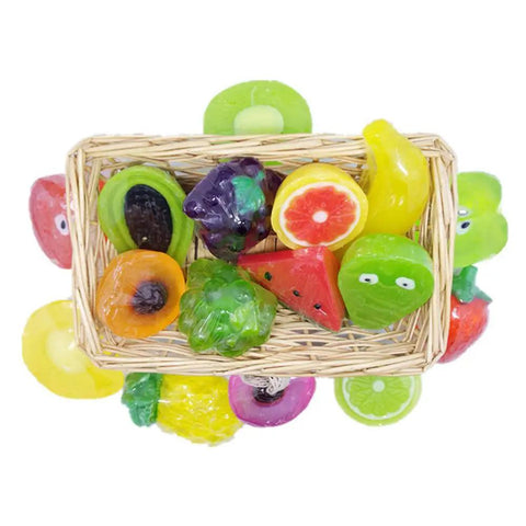 Colorful assortment of fruit-shaped soaps in a basket, ideal for decoration or gift wrapping. Perfect for craft projects.