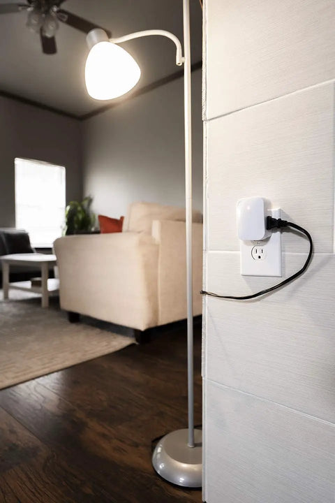 Wireless Remote Light Switch With Plug In Receiver on wall, controlling lamp in living room, hassle-free setup for indoor lighting