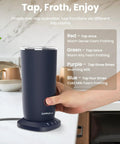 Hand pressing button on dark blue 4 In 1 Milk Frother And Steamer For Latte And Cappuccino At Home, Warm And Cold Foam, Milk Warmer To About 150F, Rich Creamy Froth, Dark Blue Electric Coffee Frother.
