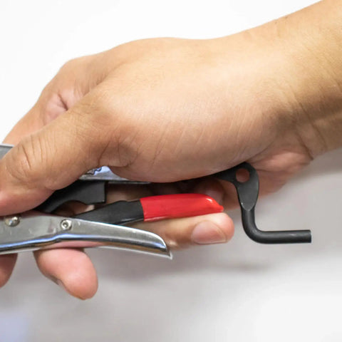 Hand holding Pro Grade Pipe Pliers With Large V Pads, 11 Inch, Adjustable Top Spindle For 1 1/2 To 2 1/2 Inch Pipes