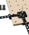 Portable Drill Guide For Three Quarter Inch Workbench Dog Holes Pro Grade Drill Template For Building MFT Table Tops Work Benches And Cutting Boards Fast Repeatable Holes For A Reliable Mobile Workshop Setup, shown on a workbench with accessories.