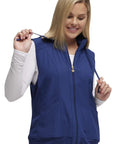 Woman wearing navy Zip Front Scrub Vest With Detachable Hood For Women, Stretch Fabric, Flattering Fit, Princess Seams, Plenty Of Pockets