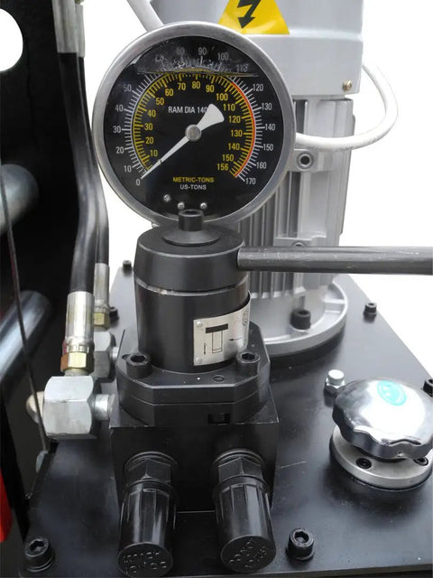 Close-up of the pressure gauge on the Heavy Duty 100 Ton Electric Hydraulic Shop Press featuring easy height adjustments.